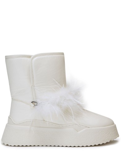 Білі шкіряні зимові уггі 